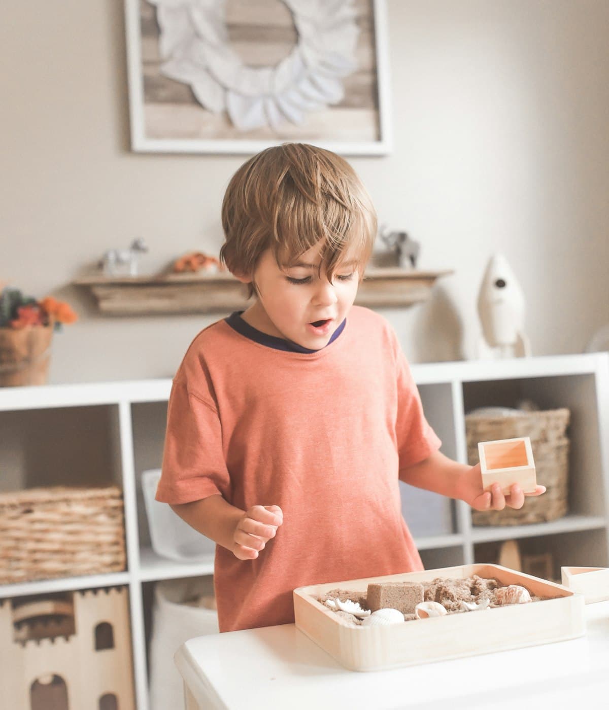 A young child playing with toys